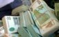 Vijf arrestaties voor witwassen en ondergronds bankieren tussen Suriname en Nederland